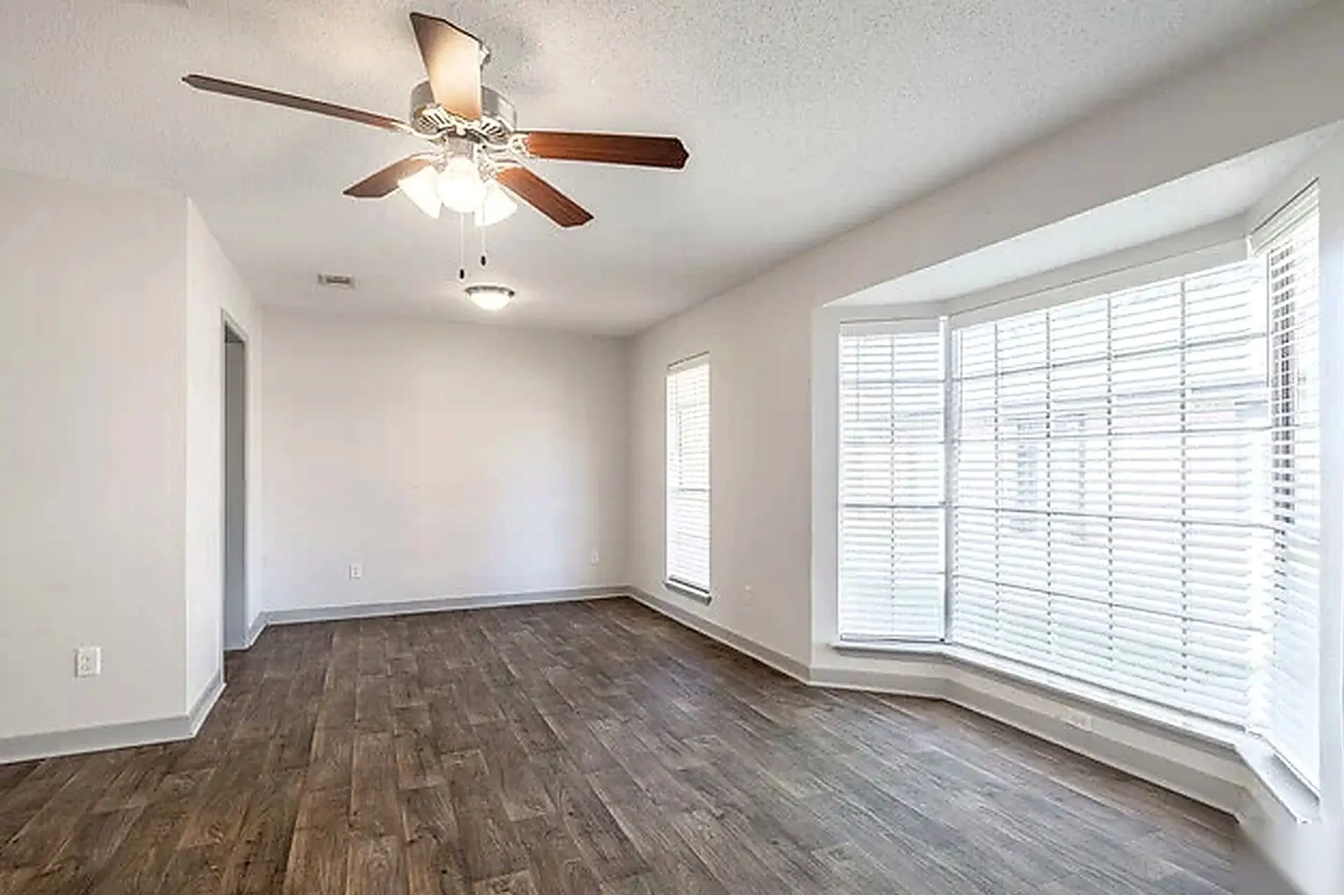 Living room with bay window and natural light